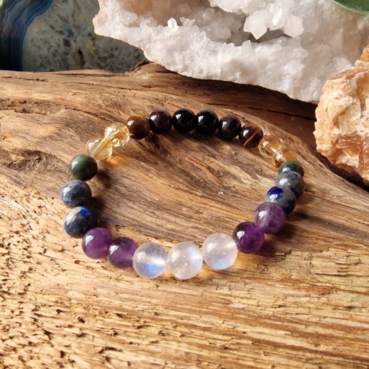 crystal bracelet crafted with Obsidian, Garnet, Tiger Eye, Citrine, Jade, Lapis Lazuli, Amethyst and Moonstone 