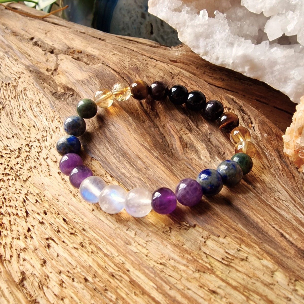Chakra clearing bracelet made with natural high-quality Moonstone, Amethyst, Lapis Lazuli, Canadian Jade, Citrine, Tiger Eye, Garnet and Obsidian crystal beads