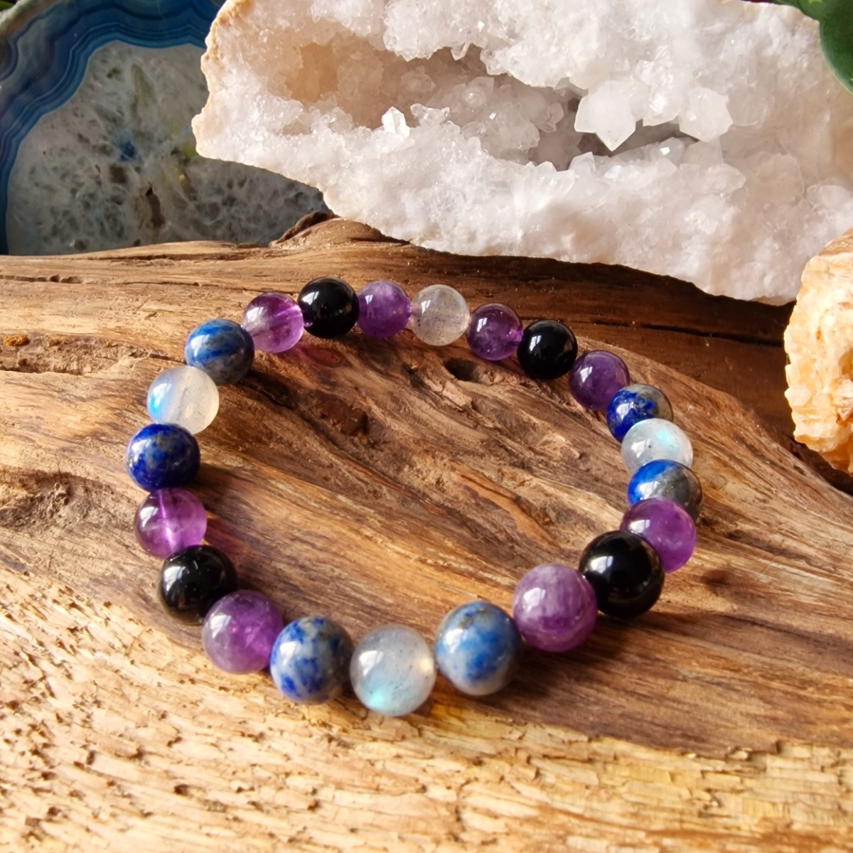 Anxiety reducing healing crystal bracelet made with labradorite, amethyst, lapis lazuli, and obsidian