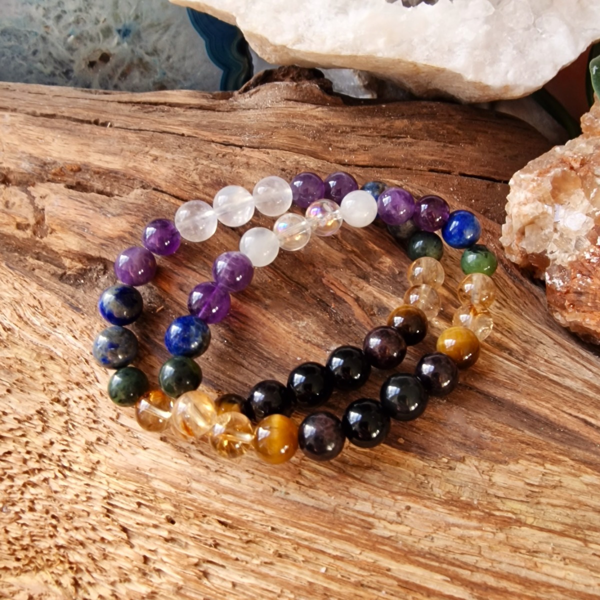Chakra clearing and chakra balancing crystal bracelets in a stack 